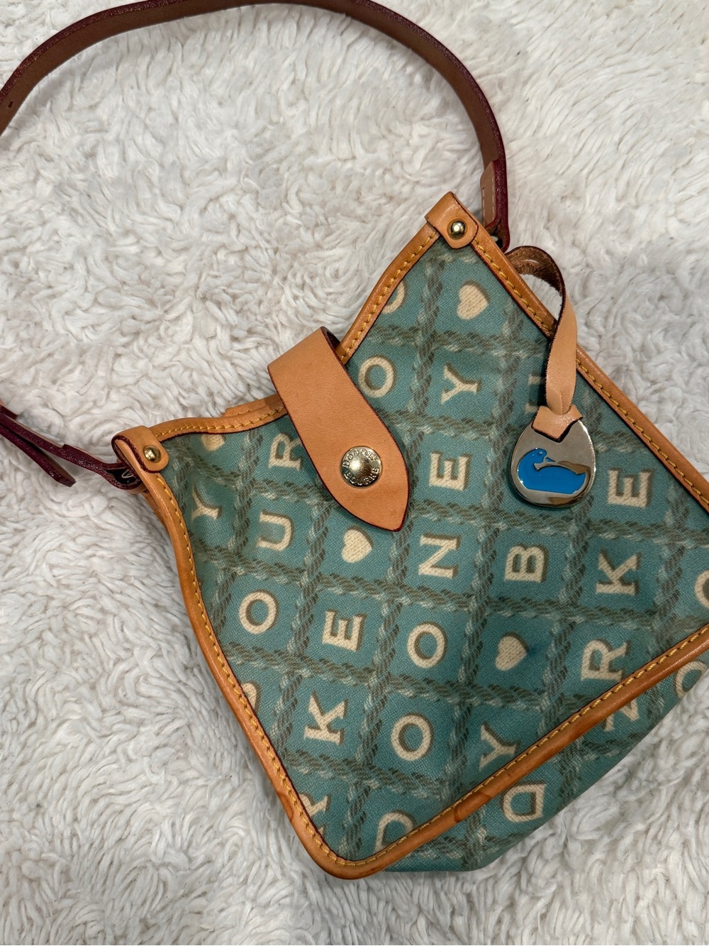 Dooney & Bourke Teal Patterned Mini Bag with Tan Trim